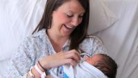 Mother with healthy newborn baby